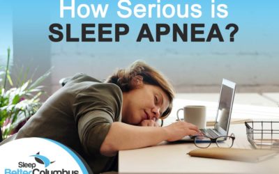 Photo of a woman sleeping at her desk with the text: How Serious is Sleep Apnea?